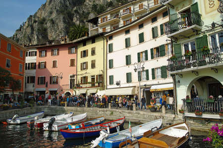 LIMONE SUL GARDA, ITALY - MARCH 27, 2015: The boats in Town Limone Sul Garda, Lake Garda, Italy. Limone sul Garda is a town in Lombardy (northern Italy), on the shore of Lake Garda.のeditorial素材