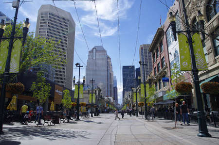 CALGARY, CANADA - MAY 26: Tourists stroll along historic Stephen Avenue in downtown Calgary on May 26, 2016. Calgary, Alberta, Canadaのeditorial素材