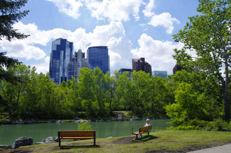 CALGARY, CANADA - MAY 26: Modern Downtown view taken from Prince's Island Park on May 26, 2016 in Calgary, Alberta Canada.のeditorial素材