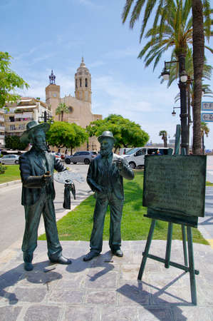 SITGES, SPAIN - JUNE 27: Monument to Santiago Rusinol and Ramon Casas on June 27, 2017 in Sitges, Spain. This statue pays tribute to both international catalan modernist artists established in Sitgesのeditorial素材