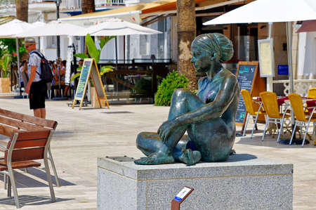 SITGES, CATALUNYA, SPAIN - JUNE 27, 2017: Sculpture of a naked woman on the waterfront.のeditorial素材