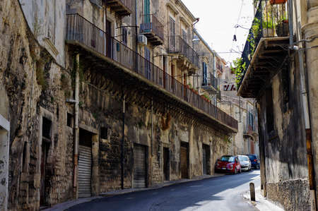 MODICA, ITALY - AUGUST 11th, 2017: Typical gothic architecture in old city center, upper Modica on August 11, 2017, Sicily, Italyのeditorial素材