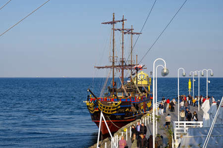 SOPOT, POLAND: SEPTEMBER 30, 2017 : The Pirate galleon docked at the wooden pier in Sopot. This is a...