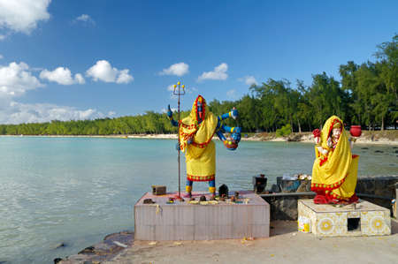 Hindu Goddess - Kali in small Hindu Temple under the open sky located just next to Trou-aux-Biches, Mauritius islandの写真素材