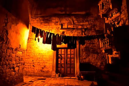 Narrow streets of mediterranean city. Trogir at night. Croatia.の写真素材