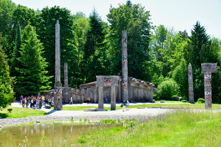 VANCOUVER, BC, CANADA, JUNE 03, 2019: First Nations totem poles and Haida houses in Museum of Anthropology at the University of British Columbia UBC campus in Vancouverのeditorial素材