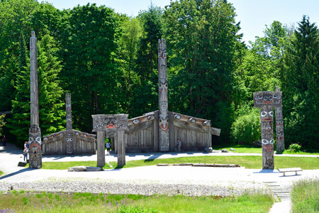 VANCOUVER, BC, CANADA, JUNE 03, 2019: First Nations totem poles and Haida houses in Museum of Anthropology at the University of British Columbia UBC campus in Vancouverのeditorial素材