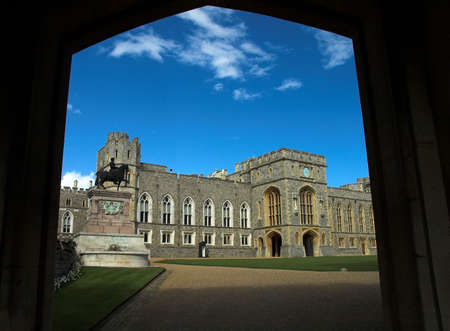 a doorway to windsor castle with the state apartments and the upper ward in the backgroundの写真素材