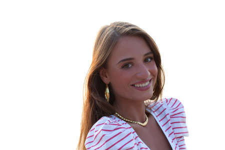 Fashion portrait of young woman looking at camera