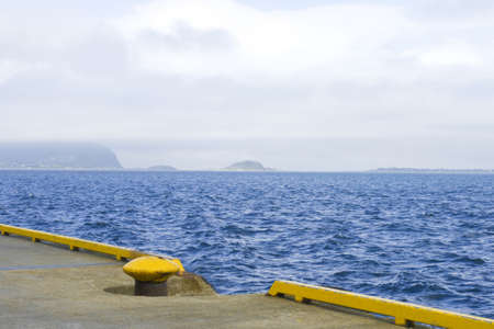 Mooring at Atlantic ocean, wind weather, Norwayの写真素材