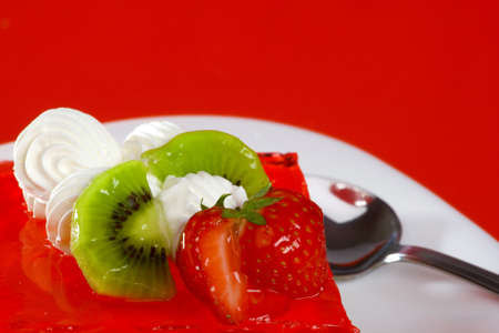 Red dessert, on white plateの写真素材