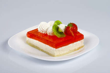 Red dessert, on white plateの写真素材