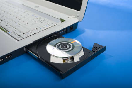 Dvd-rom of laptop, balck and white, keywordの写真素材