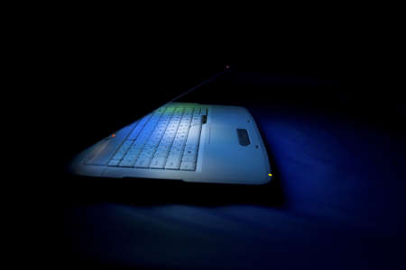 lightening laptop and keyboard, white and blackの写真素材