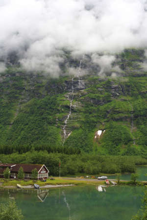 House on coast and around the mountain