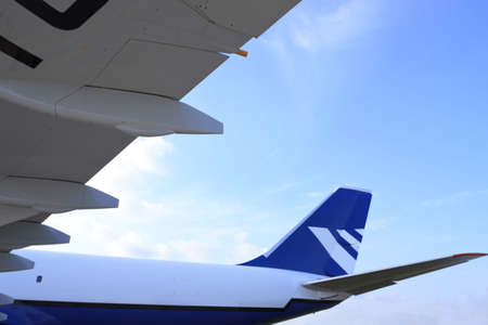 The cargo plane, view from under a wingの写真素材