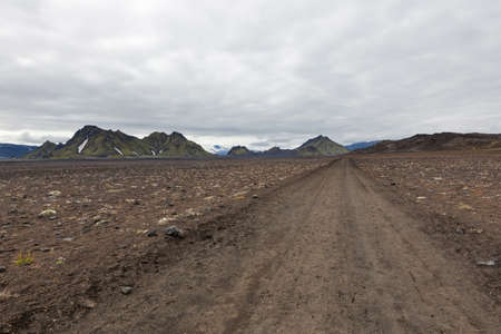 Iceland rural road in beautiful icelandic mountain landscape. Iceland adventure hiking Laugavegur trail to Landmannalaugar.の写真素材