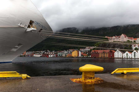 Bergen - Jul 2, 2017: Big cruise ship bow in Bergen port, Norway.のeditorial素材