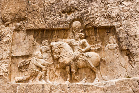 Ancient bas-relief in old city Persepolis in Iran.