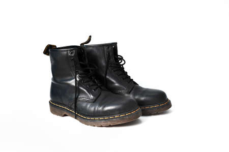 a highly meritorious black leather boots worn 