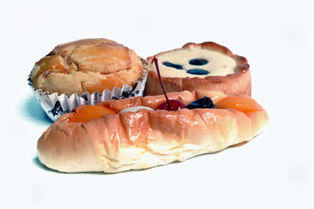 sweet bread with cherries, raisins, jam, peaches, lychees and blueberriesの写真素材