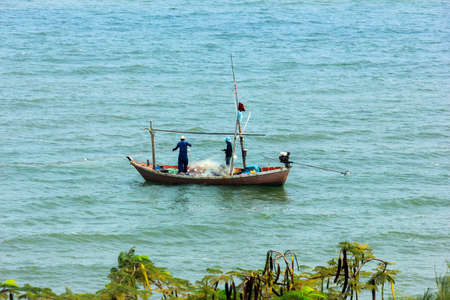 Fishermen at Seaの写真素材