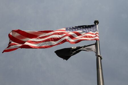 Washington DC, USA - may 13, 2012. Stars and stripes USA flag on a city streetのeditorial素材