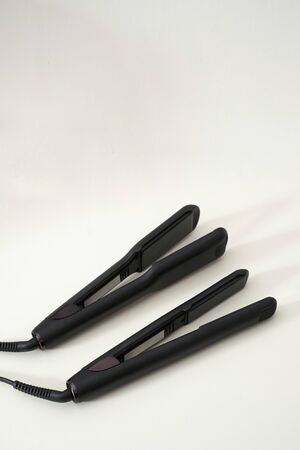 hair irons on a white backgroundの写真素材