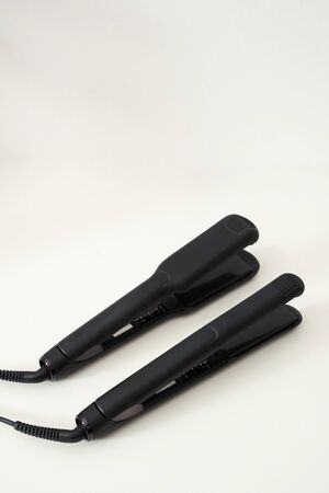 hair irons on a white backgroundの写真素材