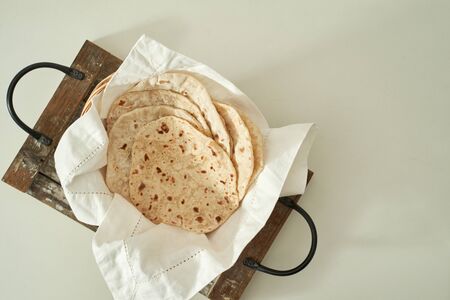 homemade pita bread on white background の写真素材