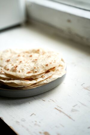 homemade cakes on a wooden boardの写真素材