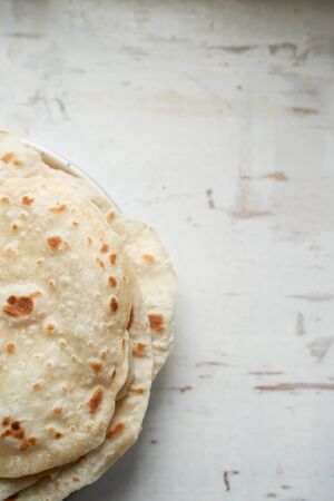 pancakes on a wooden boardの写真素材