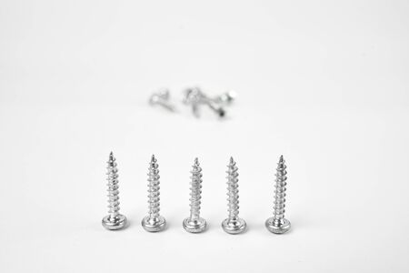 Screws in the foregroundの写真素材