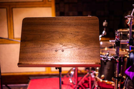 music stand without notes in a recording studioの写真素材