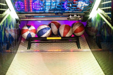 folded striped game balls