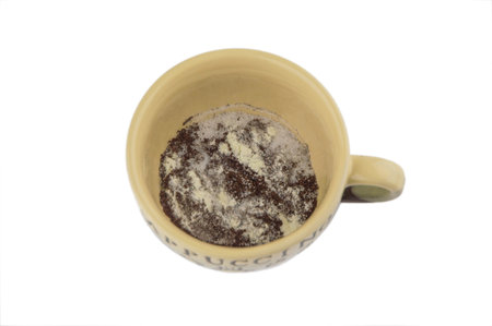 short rest at the hard worker: 3 in 1 - a Cup with coffee, dry cream and sugar, blended in a mug, isolated on white, angledの写真素材