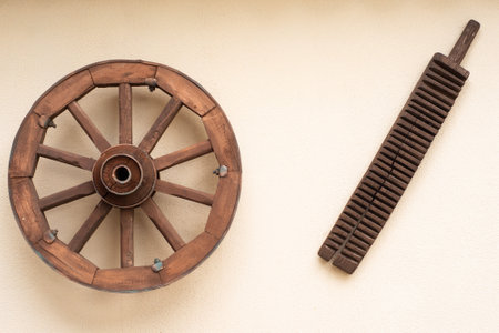 village, decorative vintage implements on the wall of the houseの写真素材