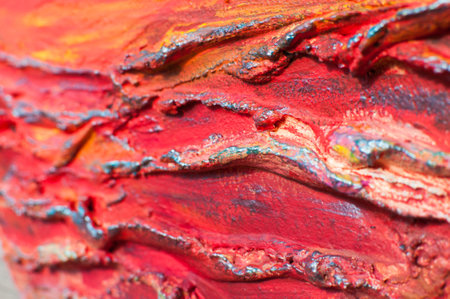 abstract of red oil paint on wood texture for background used.の写真素材