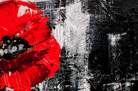 artistic black background with white and red paint spots in the form of flowersの写真素材