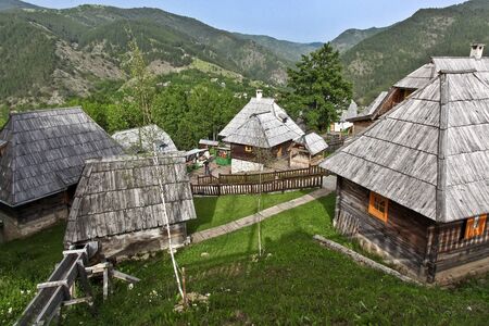 DRVENGRAD, SERBIA - MARCH 29, 2010: Drvengrad is a traditional village that the Serbian film director Emir Kusturica built for his film Life Is a Miracle.It is a ethno-village in mountain nature park Mokra Gora.のeditorial素材