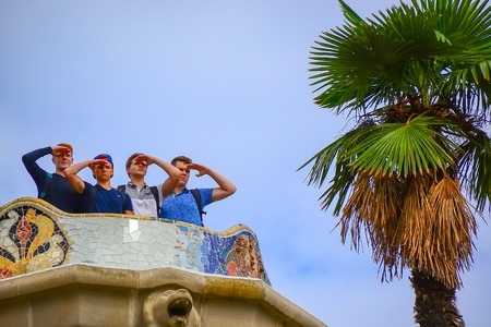 Tourists in the amazing Park Guel in Barcelona. Park Guell is the famous architectural town art designed by Antoni Gaudi.のeditorial素材