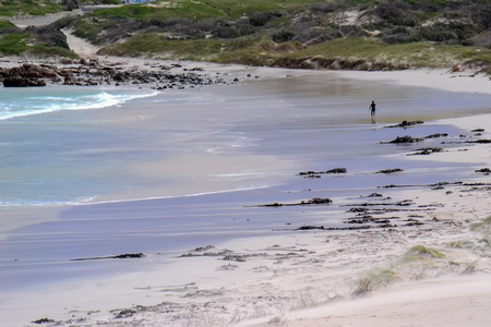 Surfer on Scarborough beach, South Africaの写真素材