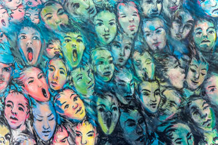 Colorful faces on the Berlin wall