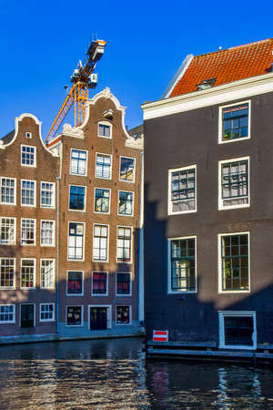 View on the canal and houses in Amsterdamのeditorial素材