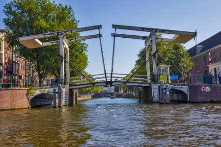 Bridge on the river in Amsterdamのeditorial素材