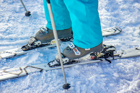 Ski boots on the white snowの写真素材