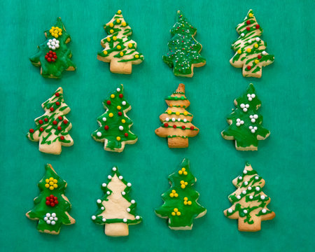 Gingerbread cookies on the green backgroundの写真素材
