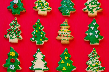 Gingerbread cookies on the red backgroundの写真素材
