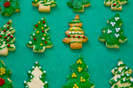 Gingerbread cookies on the green backgroundの写真素材
