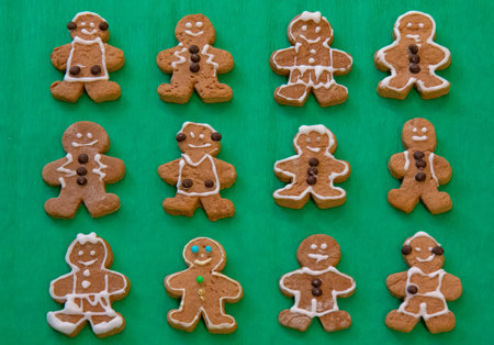 Gingerbread cookies on the green backgroundの写真素材